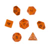 7 polyedrische leuchtende RPG Würfel in orange mit Beutel - DiceBuddy